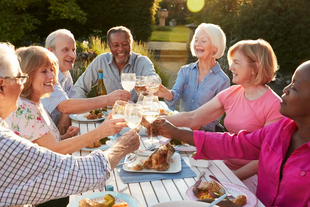 seniors enjoying an outdoor meal